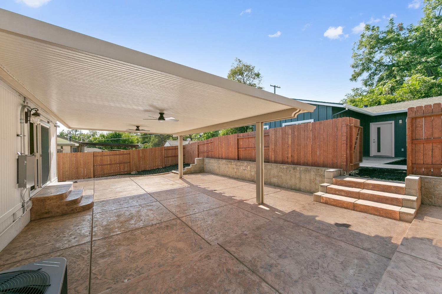 Backyard patio between the Oak Avenue home and the new ADU